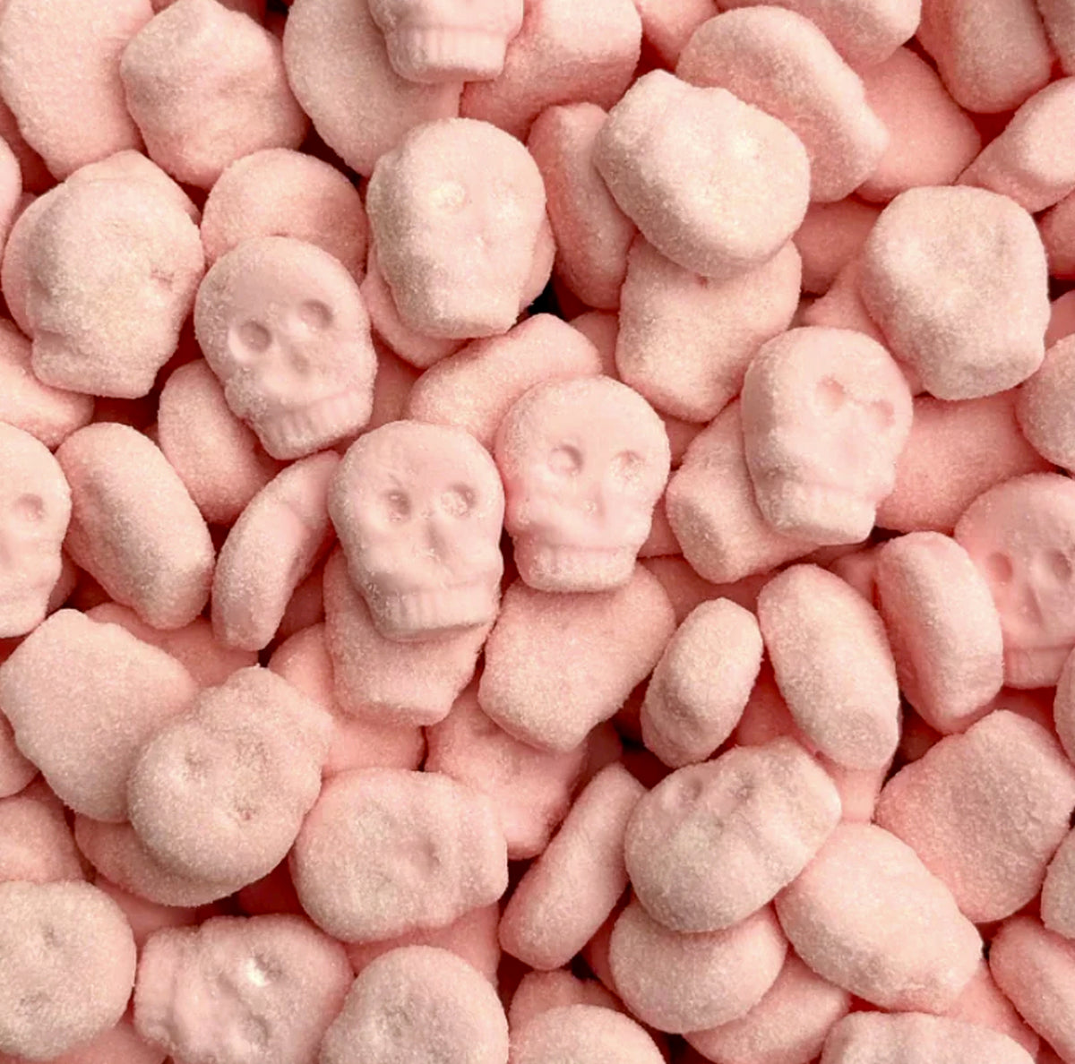 Strawberry Chewy Skulls — Soft strawberry foam candy shaped like little skulls