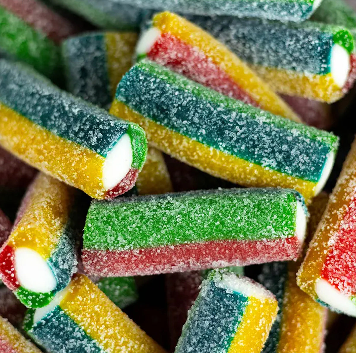 Sour Rainbow Minis — Mini rainbow rolls packed with sour sugar and fruity flavor