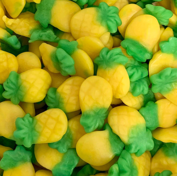 Pineapple Vibes — Juicy pineapple-shaped gummies with tropical flavor and a sunny chew