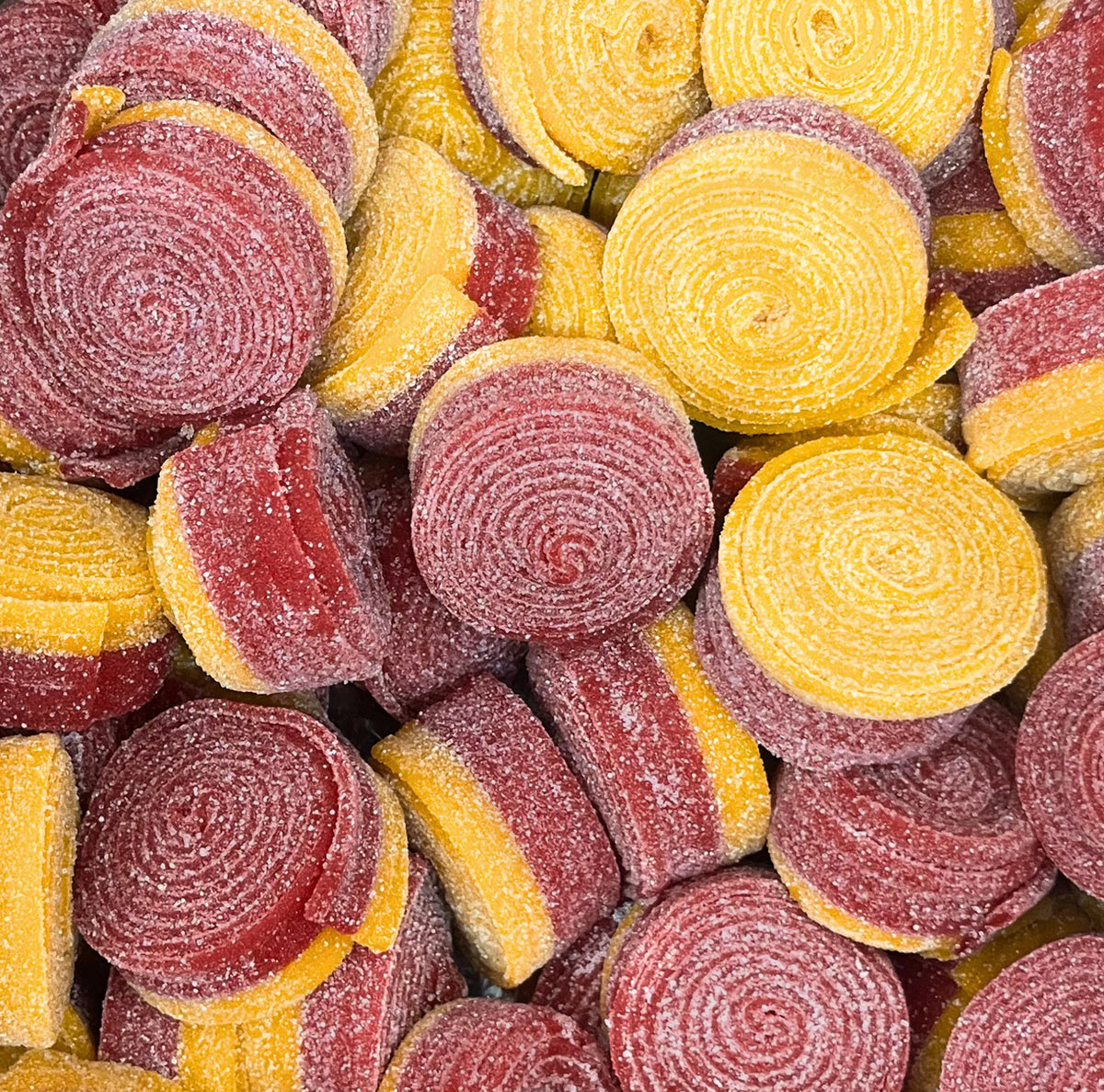 Strawberry Lemon Rollz — Sour strawberry and zesty lemon swirl together in these chewy rolls