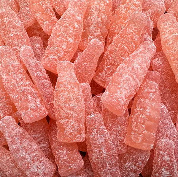 Grapefruit Soda Bottles — Zesty, tangy, and fizzy - grapefruit soda bottle gummies with a citrusy pop in every chew