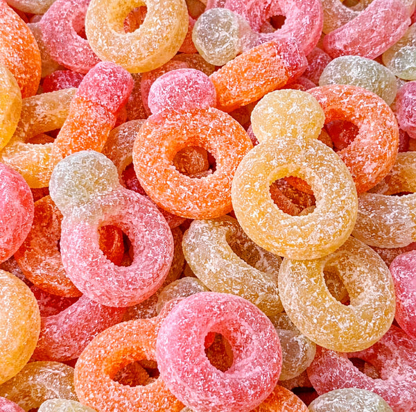 Diamond Rings — Chewy, tangy rings in cola, peach, and bubblegum flavor