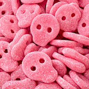 Sour Pinky Skulls — Strawberry gummy skulls with a sour punch
