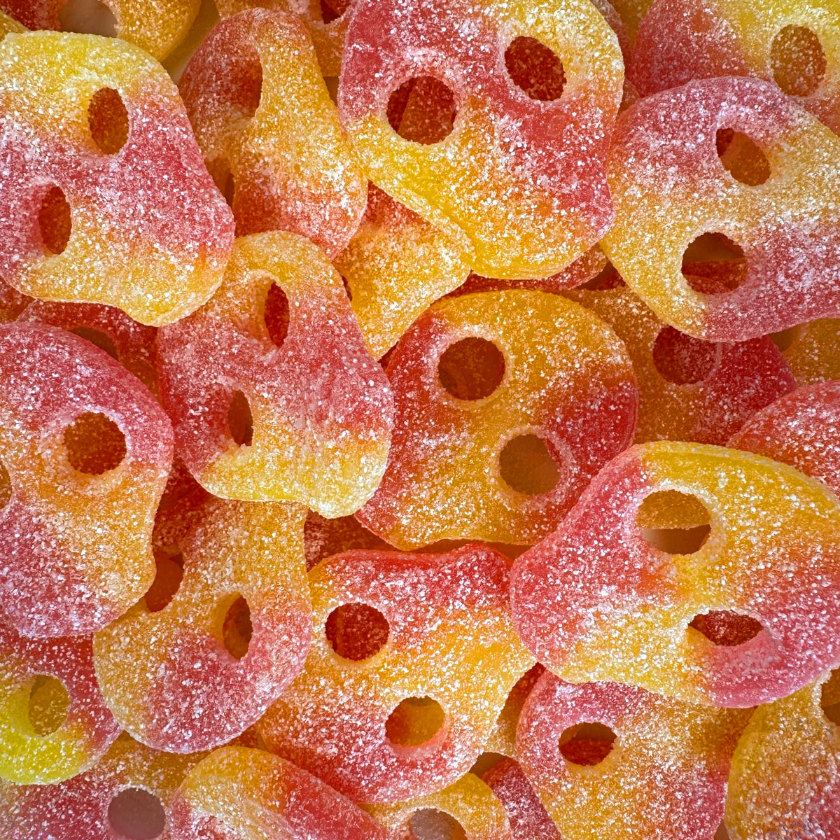 Sour Citrus Razzy Skulls — Two flavors, one skull. Lemon and raspberry with a sour coating