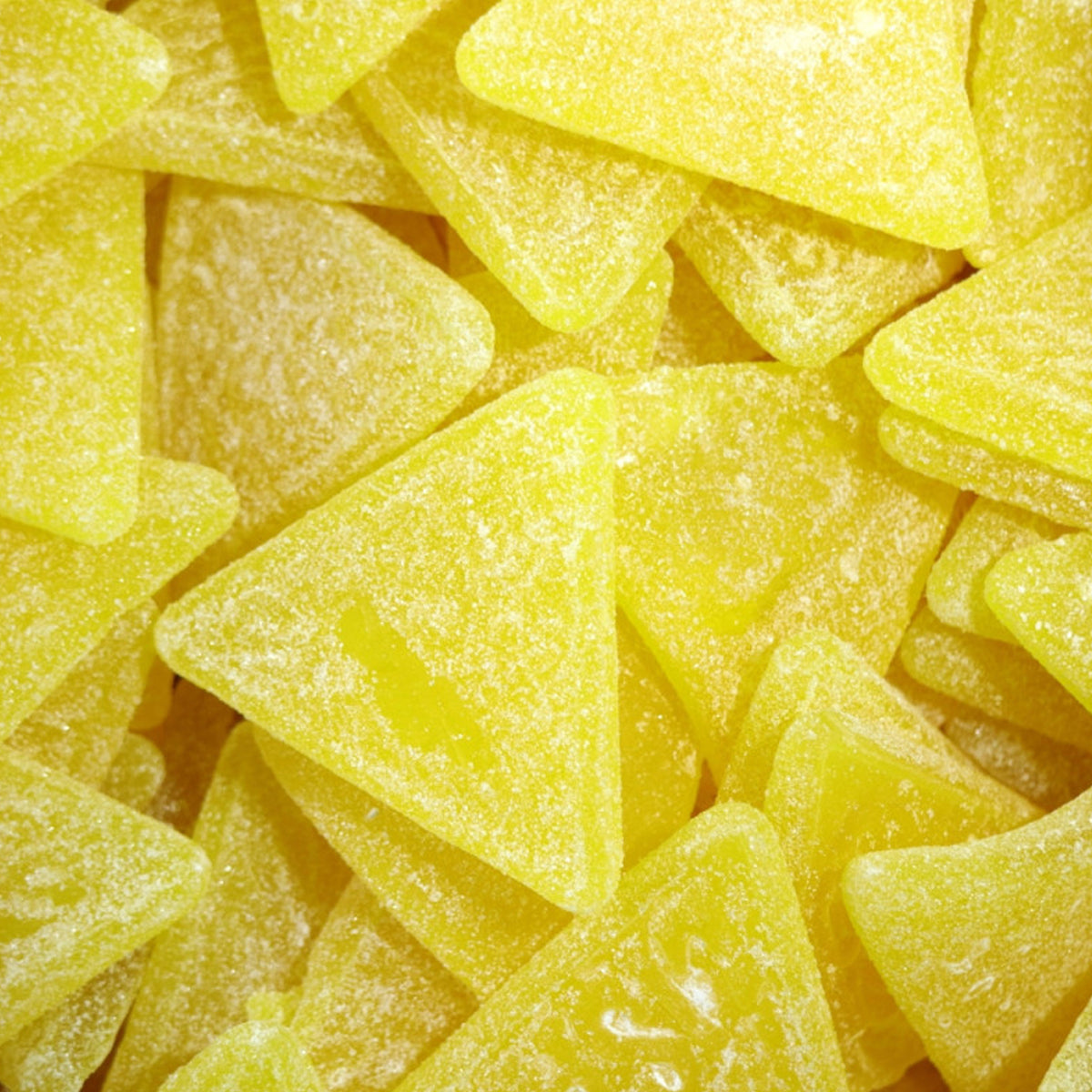 Sour Lemon Triangles — Lemon at full volume. Springy triangle gummies with a citric crunch and bright zing
