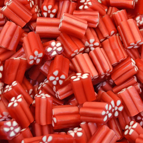 Strawberry Revolvers — Swedish favorite. Strawberry candy with a creamy vanilla fondant center, shaped like a classic