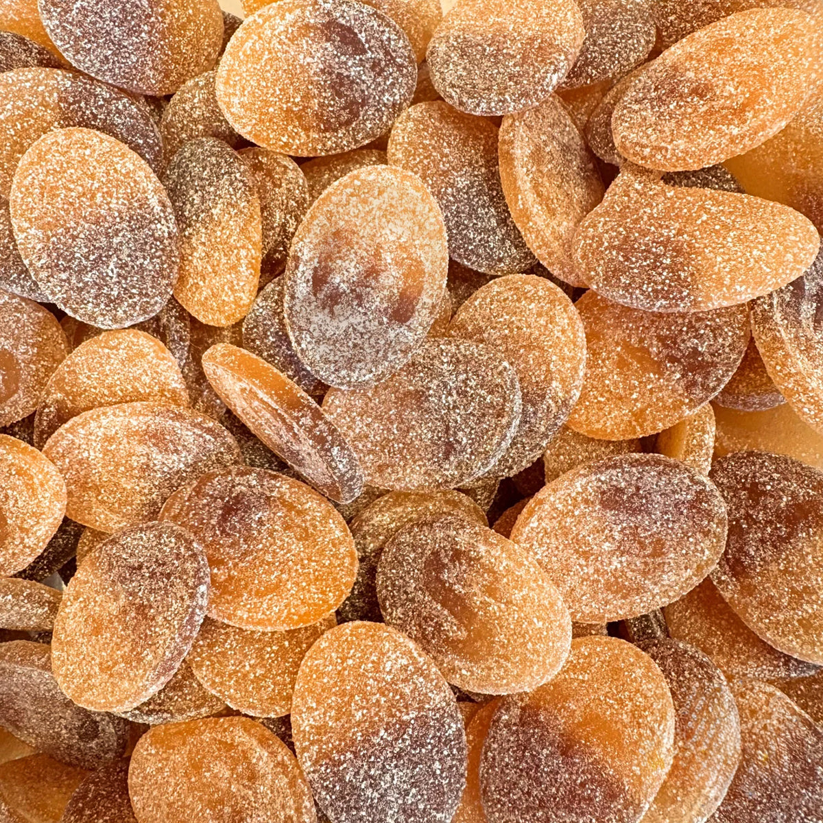 S-Ovals Sour Peach & Cola — Sour peach meets fizzy cola in this chewy Swedish gummy with a tangy kick and a sweet finish
